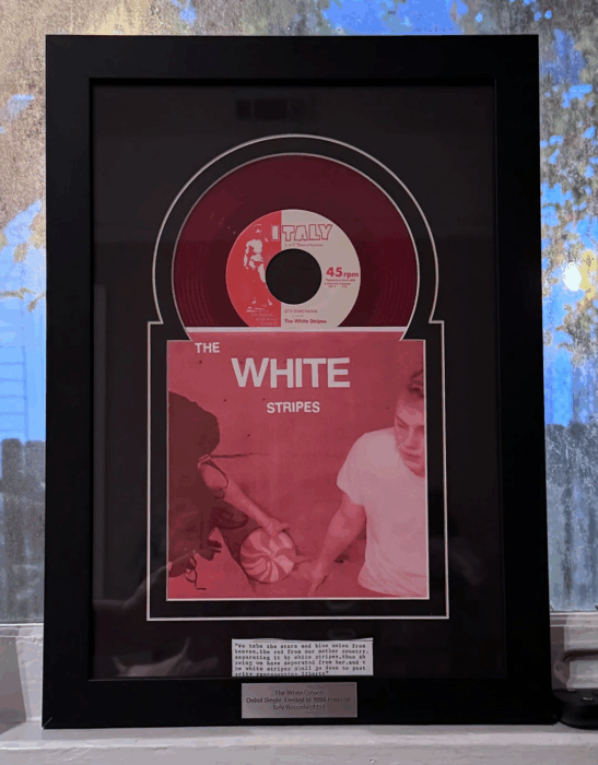 Framed copy of The White Stripes single Let's Shake Hands